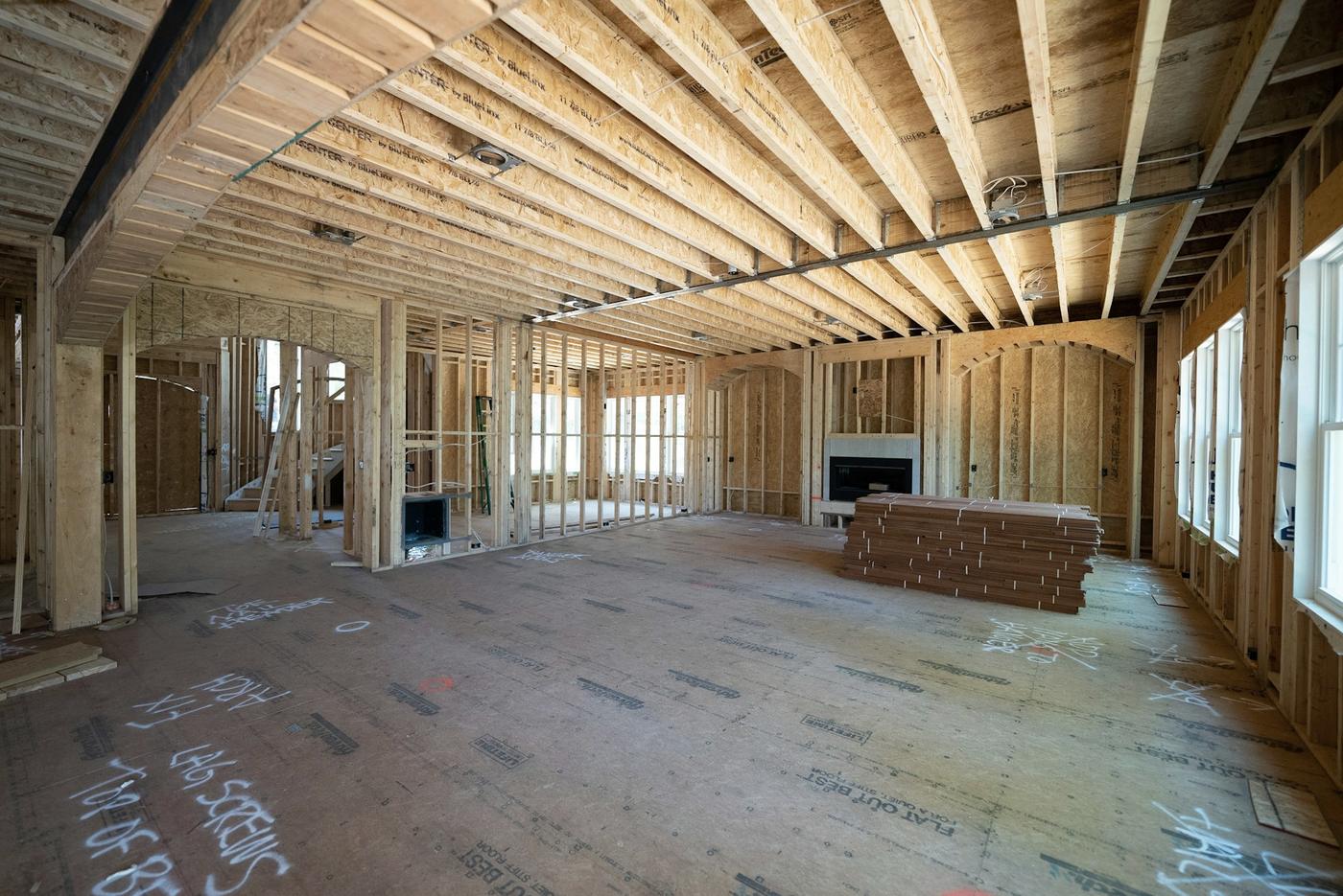 Interior of a historic house opened to the studs and joists during renovation